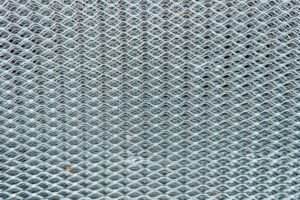Steel wire mesh in an organized pattern.