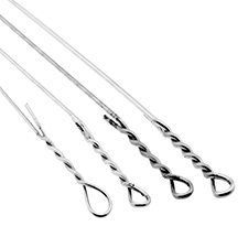 Four different galvanized bale ties against a white background.