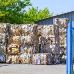 Recycling bales at processing plant with recycling wire