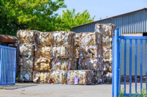Recycling bales at processing plant with recycling wire